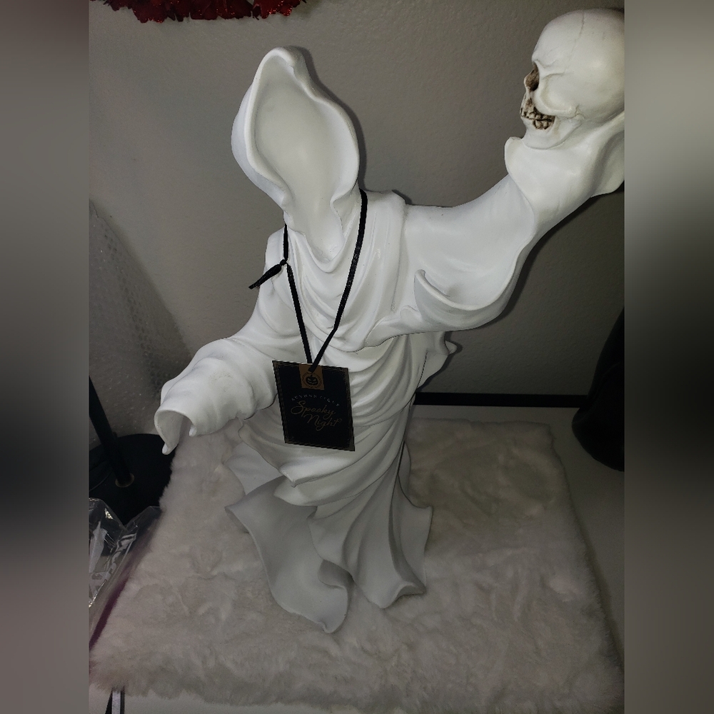 Spooky Night White Ghostly Halloween Figure with Skull
